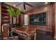 Refined home office featuring a detailed desk, elegant built-in shelving, and ample space for work and display at 64 Promontory Ridge Dr, Las Vegas, NV 89135