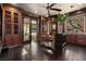 Sophisticated home office with custom built-ins, a stylish desk, and natural light offering a productive workspace at 64 Promontory Ridge Dr, Las Vegas, NV 89135