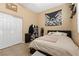 Comfortable bedroom with large closet and ceiling fan, perfect for a restful night's sleep at 7232 Frontier Hills Ave, Las Vegas, NV 89113