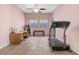 Spacious bonus room with multiple windows and ceiling fan provides natural light at 7232 Frontier Hills Ave, Las Vegas, NV 89113