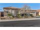 Charming single-story home with a well-maintained desert-landscaped front yard and a two-car garage at 7232 Frontier Hills Ave, Las Vegas, NV 89113