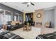 Warm living room features a fireplace and comfortable seating, great for relaxing and entertaining at 7232 Frontier Hills Ave, Las Vegas, NV 89113