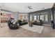 Open living room with tile floors and ceiling fan at 7232 Frontier Hills Ave, Las Vegas, NV 89113