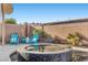 Backyard pool with relaxing spa and plenty of seating for guests at 7232 Frontier Hills Ave, Las Vegas, NV 89113