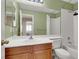 Cozy bathroom showcasing a bathtub, toilet, mirror, and sink at 7416 Tuckaway Harbor St, Las Vegas, NV 89139