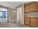 Hallway featuring unique cabinets and neutral colored walls at 7416 Tuckaway Harbor St, Las Vegas, NV 89139