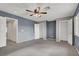 Large main bedroom featuring neutral walls and two closets at 7416 Tuckaway Harbor St, Las Vegas, NV 89139