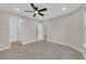 Bedroom with a ceiling fan, tile floors, and closet at 7803 Canoe Ln, Las Vegas, NV 89145