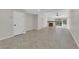 Bright, expansive living room with tile floors and cozy fireplace feature at 7803 Canoe Ln, Las Vegas, NV 89145