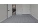 This bedroom features gray walls, gray carpet, white doors, and white baseboards at 793 Vortex Ave, Henderson, NV 89002
