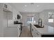 Modern kitchen featuring stainless steel appliances and an open concept layout at 793 Vortex Ave, Henderson, NV 89002
