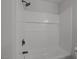 Bright shower and tub combo with sleek hardware, modern design and a built-in shelf at 793 Vortex Ave, Henderson, NV 89002