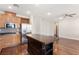 Spacious kitchen with stainless steel appliances and a large island with dark wood at 806 Neath Ave, Las Vegas, NV 89178