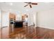 Open-concept living room flows into the kitchen with hardwood floors at 806 Neath Ave, Las Vegas, NV 89178