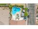 Aerial shot of a backyard with a pool, lounge area, and privacy landscaping at 8100 Artistic Heights Ct, Las Vegas, NV 89143