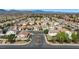 Panoramic aerial view showcasing the well-planned community, mountain views, and neighborhood streets at 8100 Artistic Heights Ct, Las Vegas, NV 89143
