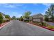 Parkside Village Astoria Homes entrance with attractive landscaping and well-maintained neighborhood access at 8100 Artistic Heights Ct, Las Vegas, NV 89143