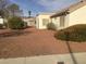 The backyard has a simple desert landscaping design, offering a low-maintenance outdoor space at 8501 Stan Crest Dr, Las Vegas, NV 89134
