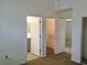 Bedroom with an attached bathroom and a closet featuring an opened door, offering practical living at 8501 Stan Crest Dr, Las Vegas, NV 89134