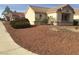 Well-maintained single-story home featuring desert landscaping with low-water plants and shrubs at 8501 Stan Crest Dr, Las Vegas, NV 89134