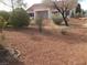 Home featuring low-maintenance desert landscaping, with desert plants creating natural textures at 8501 Stan Crest Dr, Las Vegas, NV 89134