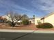 The home features desert landscaping, creating an attractive, low-maintenance front yard at 8501 Stan Crest Dr, Las Vegas, NV 89134