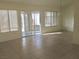 Sunlit living room with tile floors, offers a bright and inviting space for relaxing at 8501 Stan Crest Dr, Las Vegas, NV 89134