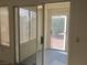 Sliding glass door to the sunroom bringing in natural light and connecting indoor and outdoor spaces at 8501 Stan Crest Dr, Las Vegas, NV 89134