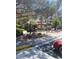 Community clubhouse featuring mature landscaping and ample parking for guests at 9000 Las Vegas Blvd # 2220, Las Vegas, NV 89123