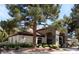 Exterior view of the community clubhouse with manicured landscaping at 9000 Las Vegas Blvd # 2220, Las Vegas, NV 89123