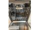 Open stainless steel dishwasher with interior racks and cleaning components at 9000 Las Vegas Blvd # 2220, Las Vegas, NV 89123