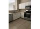 Bright kitchen with white cabinets, stainless steel appliances, and tile flooring at 9000 Las Vegas Blvd # 2220, Las Vegas, NV 89123