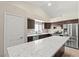 Well-lit kitchen featuring stainless steel appliances and marble countertops at 9031 W Viking Rd, Las Vegas, NV 89147