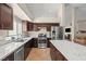 Updated kitchen features stainless appliances, a large island, and ample storage at 9031 W Viking Rd, Las Vegas, NV 89147