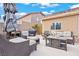 Comfortable outdoor seating area on the patio, perfect for relaxing and entertaining at 9031 W Viking Rd, Las Vegas, NV 89147