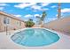 The sparkling backyard pool is surrounded by desert landscaping at 9031 W Viking Rd, Las Vegas, NV 89147