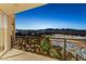 Expansive balcony with decorative wrought iron overlooking city and mountains at 9101 Alta Dr # 1205, Las Vegas, NV 89145