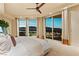 Light-filled bedroom with balcony, large windows, and sweeping views of the surrounding area at 9101 Alta Dr # 1205, Las Vegas, NV 89145
