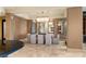 Contemporary dining room with neutral tones, rectangular table, and modern light fixture at 9101 Alta Dr # 1205, Las Vegas, NV 89145