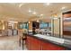 Gourmet kitchen with island seating, high-end appliances, and an open floor plan at 9101 Alta Dr # 1205, Las Vegas, NV 89145