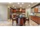 Gourmet kitchen featuring custom cabinets, stainless steel appliances, and stylish pendant lighting at 9101 Alta Dr # 1205, Las Vegas, NV 89145