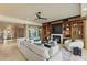 Inviting living room with plush seating, fireplace, and an open floor plan with hardwood floors at 9101 Alta Dr # 1205, Las Vegas, NV 89145