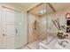 Modern shower with glass door and multiple shower heads at 9101 Alta Dr # 1205, Las Vegas, NV 89145