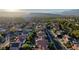 Scenic aerial shot featuring rooftops of homes in a lush green neighborhood at 9909 Barrier Reef Dr, Las Vegas, NV 89117