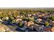 Neighborhood offering a mix of single-Gathering homes, lush greenery, and well-manicured lawns, creating an appealing setting at 9909 Barrier Reef Dr, Las Vegas, NV 89117