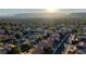 Scenic aerial view featuring community rooftops of homes in a lush green neighborhood at 9909 Barrier Reef Dr, Las Vegas, NV 89117