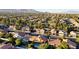 Expansive aerial showcases community, with diverse homes and serene landscape views at 9909 Barrier Reef Dr, Las Vegas, NV 89117