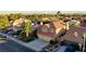 Charming two-story home with a well-manicured lawn and a spacious two-car garage at 9909 Barrier Reef Dr, Las Vegas, NV 89117