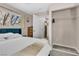 Bright bedroom with a large window and open closet space at , Las Vegas, NV 89121