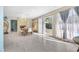 Bright dining area with tile floors, open access to the pool area, and plenty of natural light at , Las Vegas, NV 89121